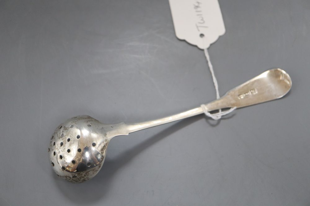 A George III Scottish provincial silver sifter ladle, I &GH, Paisley, circa 1790-1820, 16.8cm, 32 grams.